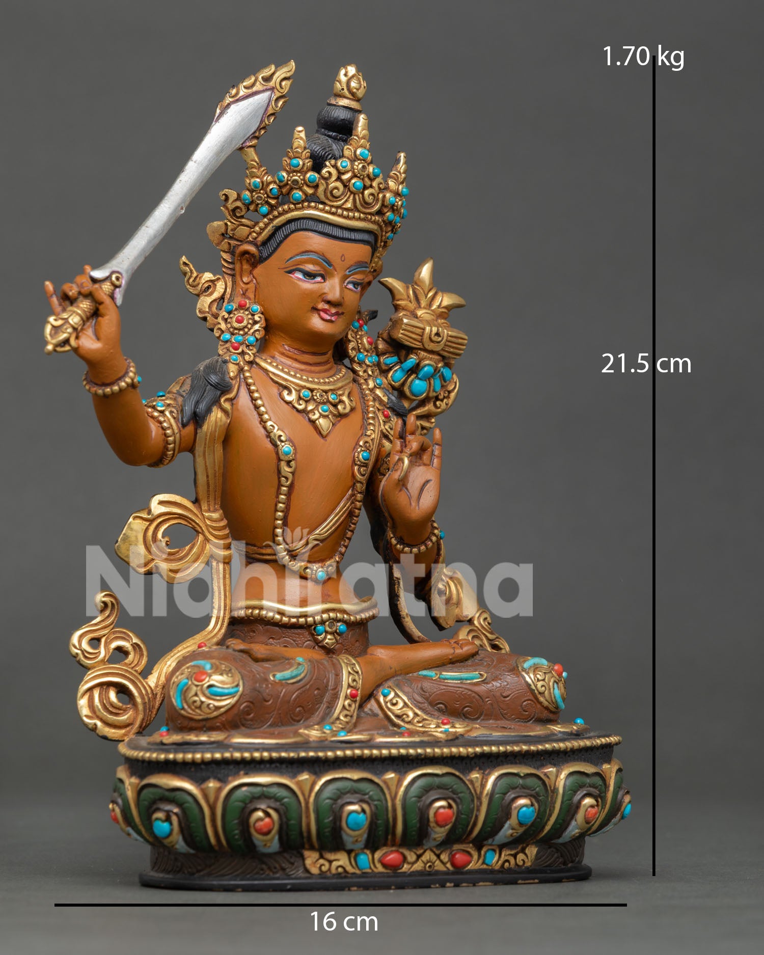 Manjushri statue with lotus flower, wisdom sword, and traditional Newari craftsmanship