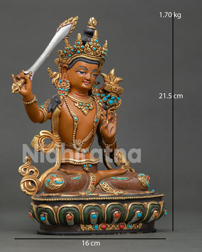 Manjushri statue with lotus flower, wisdom sword, and traditional Newari craftsmanship