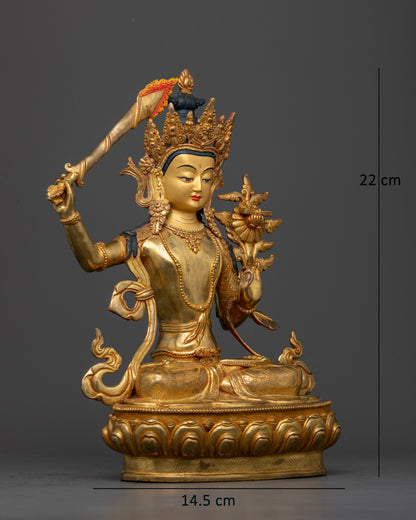 Manjushri Statue with ornate five jewel crown layered necklaces and floral patterned robe.