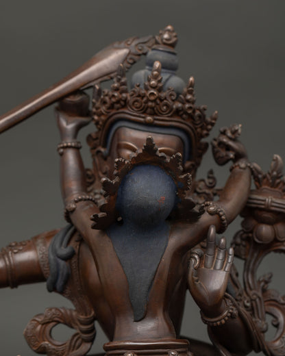 Manjushri Statue with Utpala Flower and Prajnaparamita Sutra Close Up.