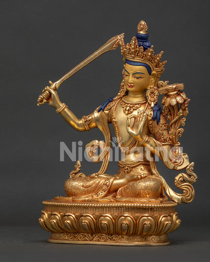 Manjushri with five jewel crown and intricate Himalayan craftsmanship.