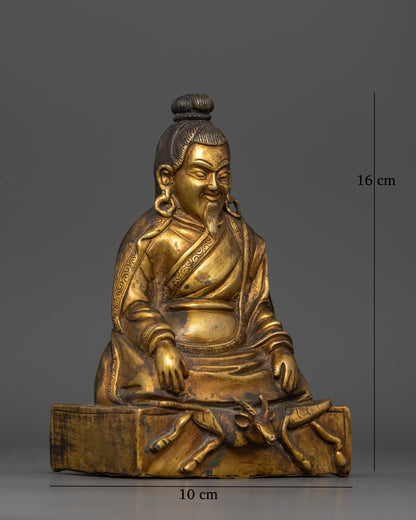 Marpa Lotsawa Buddhist sculpture seated in full meditation posture with intricate details and an antique gold finish