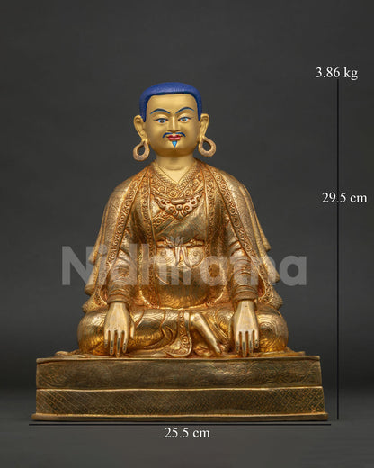 Marpa Lotsawa seated in meditation with a calm expression and relaxed hand gesture