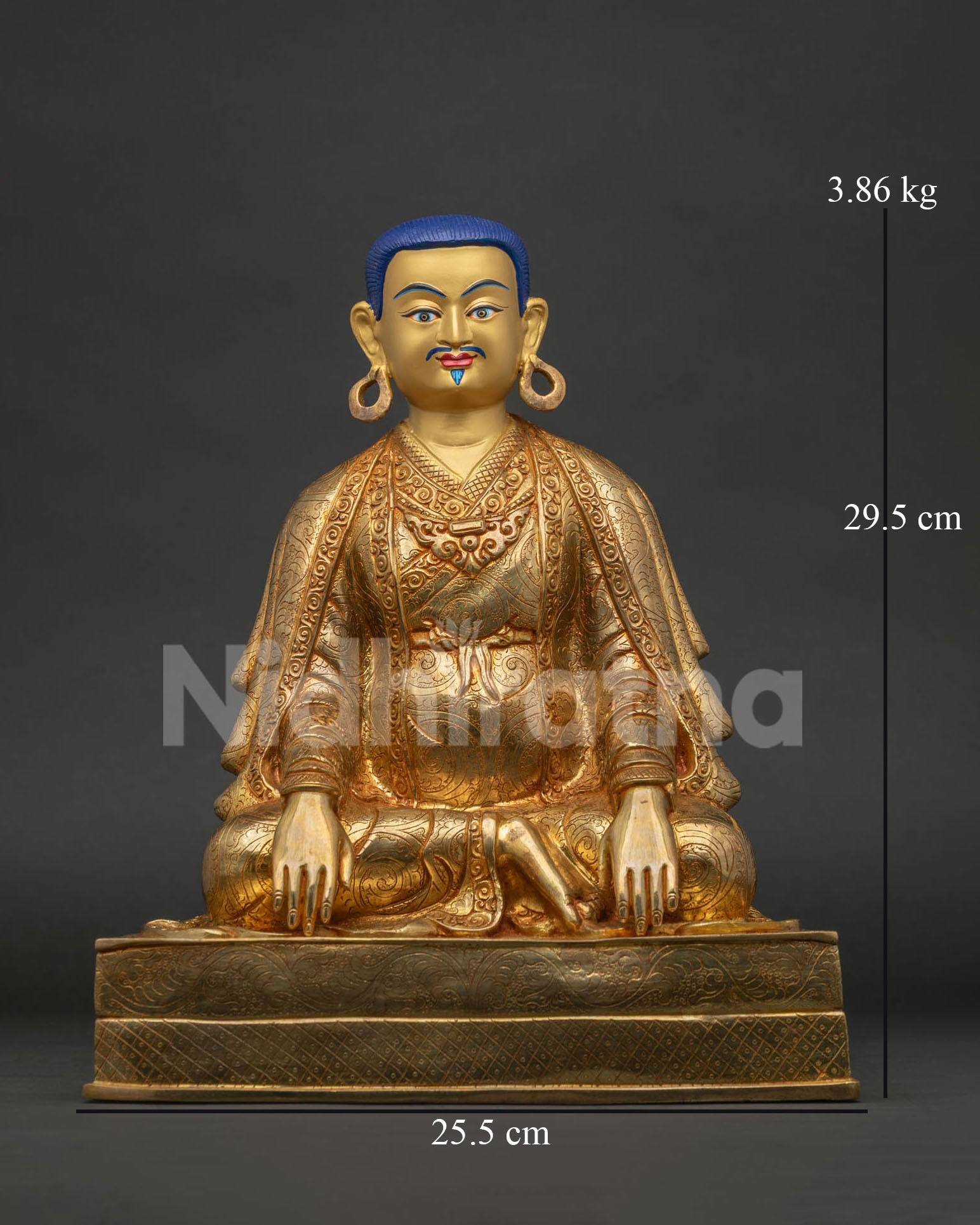 Marpa Lotsawa statue seated in peaceful meditation with a calm expression