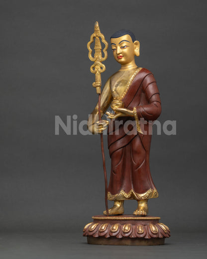 Maudgalyayana statue left side view, gold gilded Buddhist disciple sculpture