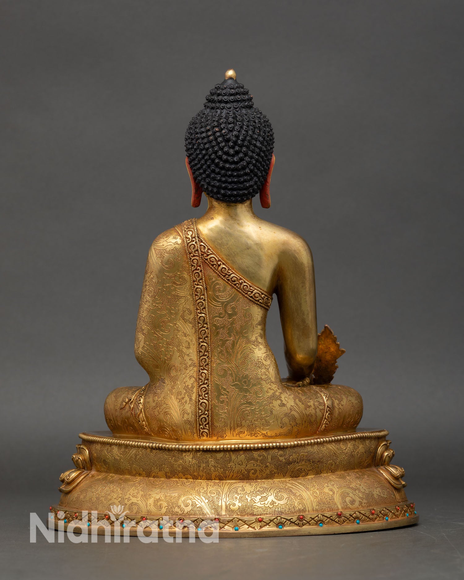 Medicine Buddha back view intricate floral scroll carving lotus base handmade Nepal statue sacred Buddhist healing altar decor
