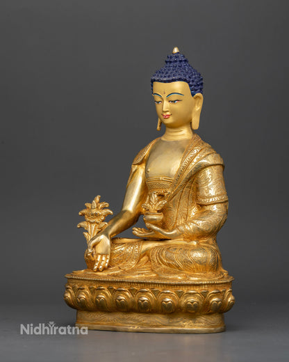 Medicine buddha bhaisajyaguru seated in meditation on hand carved lotus pedestal.