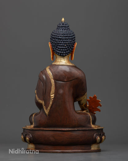 Medicine Buddha statue back view handcrafted copper sculpture partially gold fire gilded Newari art.