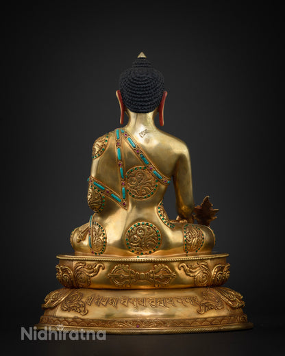 Medicine Buddha statue back view, Tibetan healing mantra engraved on lotus pedestal