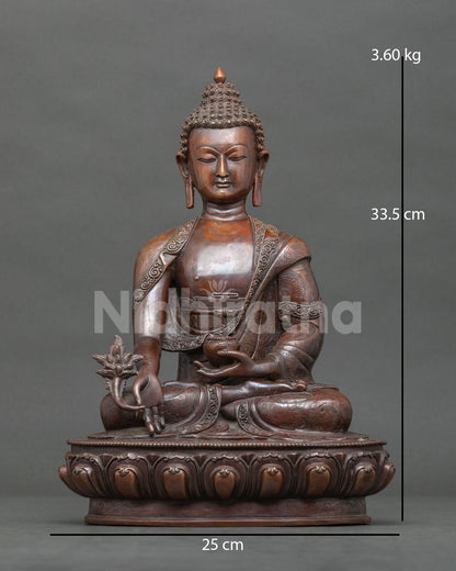 Medicine Buddha statue Bhaisajyaguru chemically oxidized copper Patan Nepal.