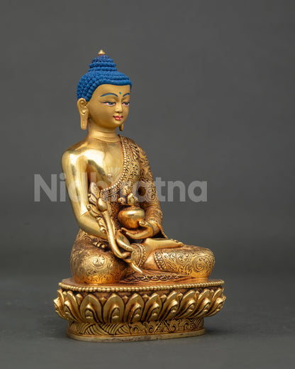 Medicine buddha statue detailed view healing nectar bowl and myrobalan.
