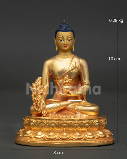 Medicine Buddha statue from Nepal front view with 24K gold gilded copper and lotus pedestal.