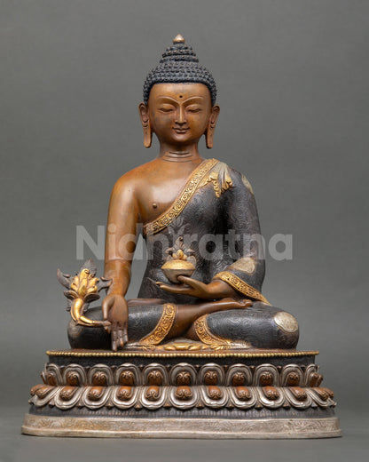 medicine buddha statue front view with oxidized copper and gold-gilded finish