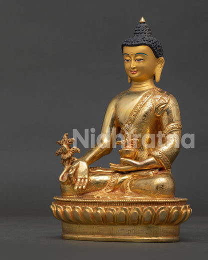 Medicine Buddha statue handcrafted by Newari artisans in Patan Nepal with gold fire gilding.