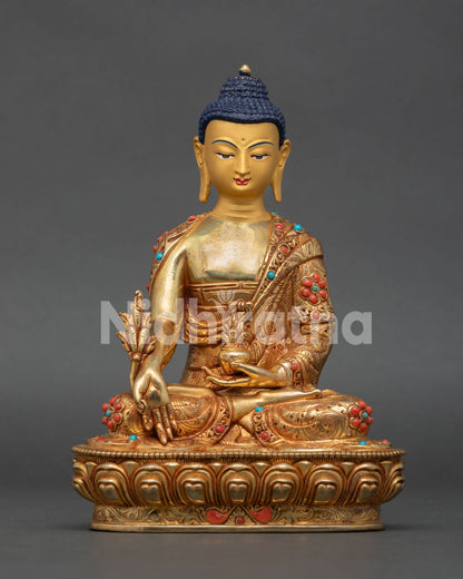 Medicine Buddha Statue handcrafted from copper with 24K fire gilded gold and semi precious stone embellishments from Nepal