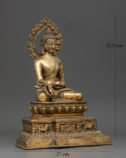 Medicine buddha statue holding myrobalan plant and healing vessel.