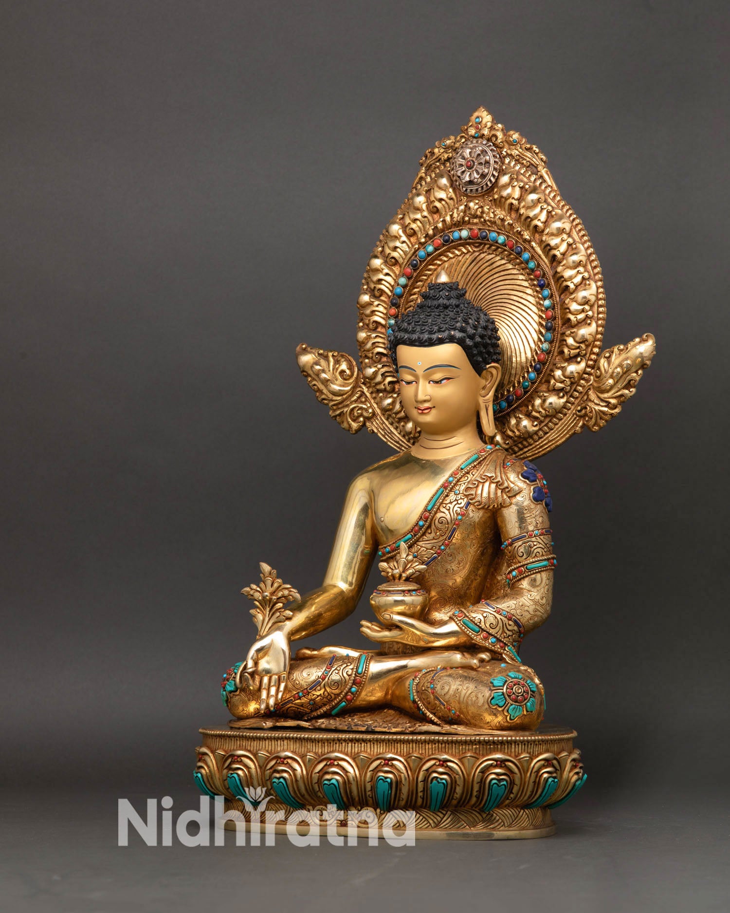 Medicine Buddha statue left side view, handcrafted Sangye Menla Buddhist altar statue with detailed robe engravings