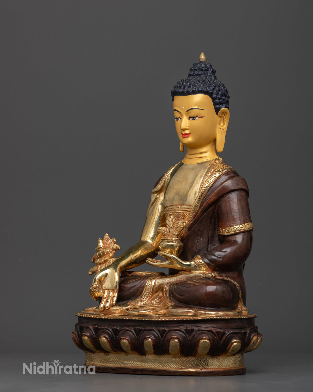 Medicine Buddha statue left view 24K gold painted face copper sculpture Newari Buddhist art.