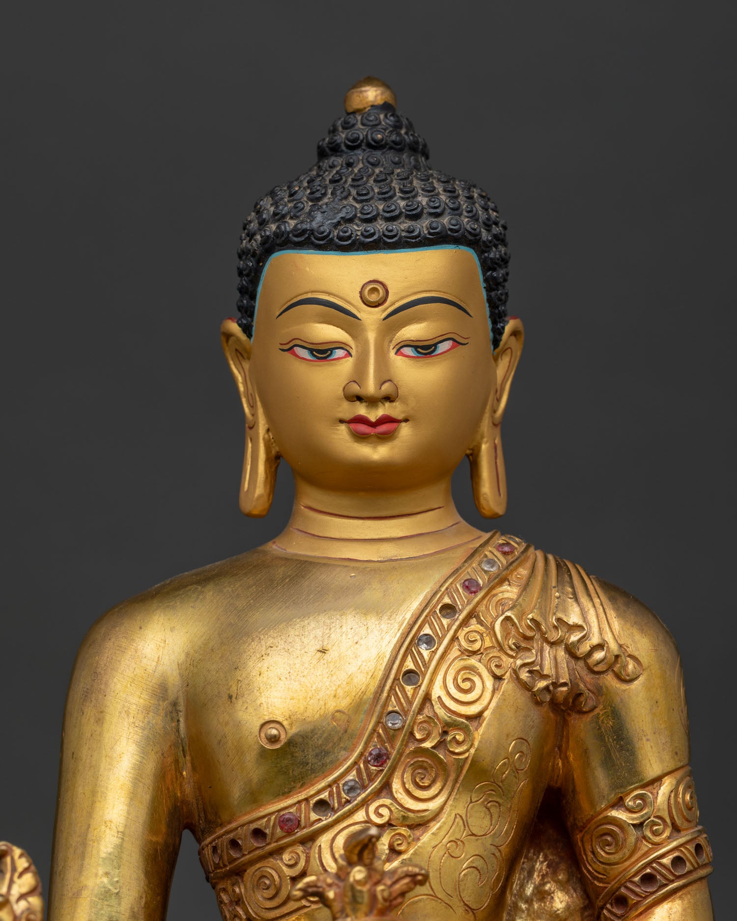medicine buddha statue regular close up with gold fire gilding and semi precious stones