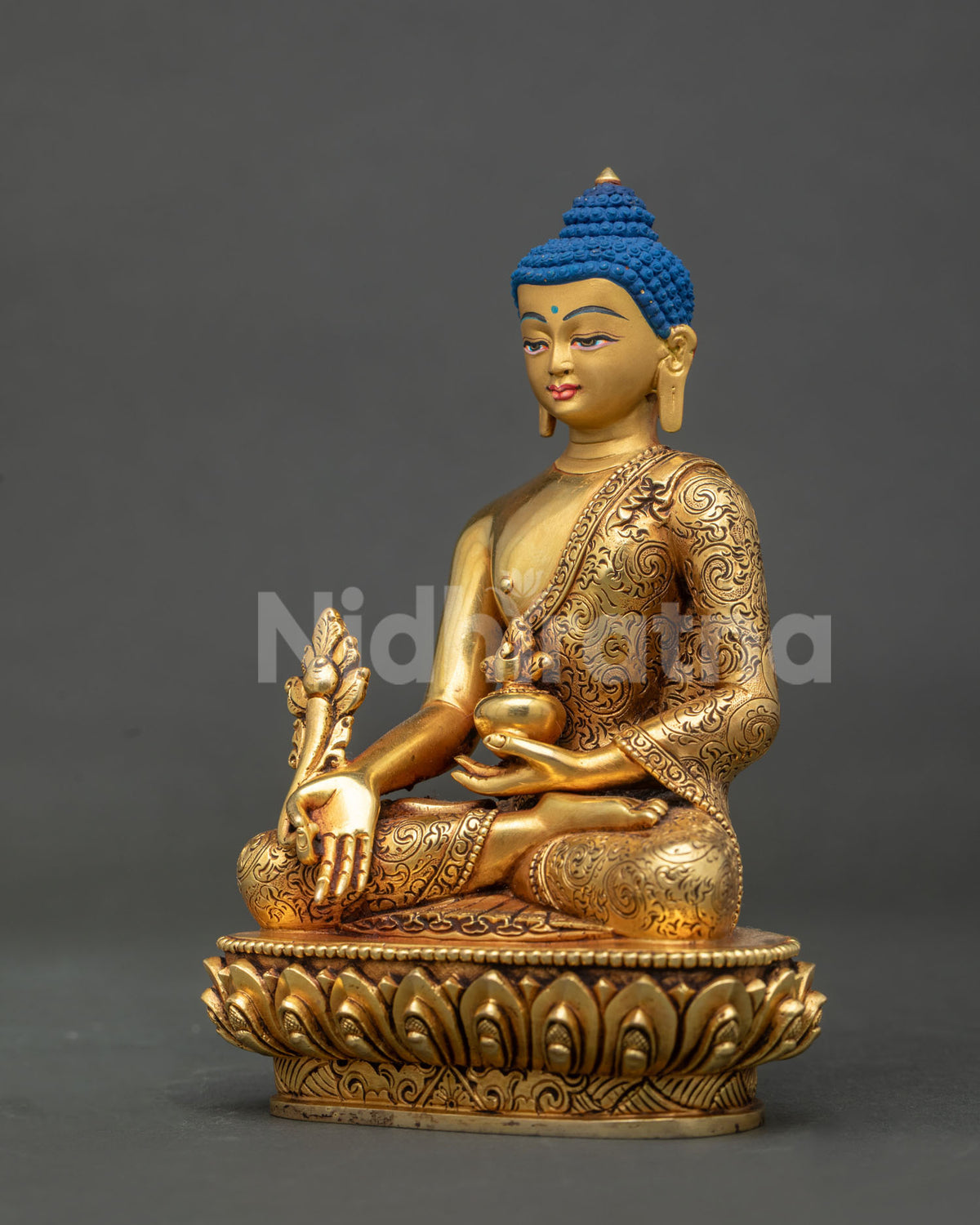 Medicine buddha statue side view handcarved floral monk robe.