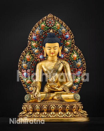 Medicine Buddha statue with gemstone prabhavali, holding healing bowl and myrobalan on lotus pedestal