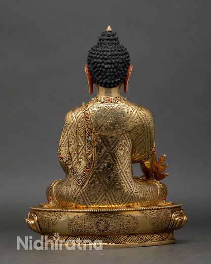 Medicine Buddha back view, detailed copper engraving, gold fire gilded finish, sacred Nepalese Buddhist craftsmanship