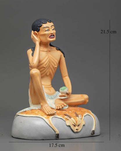 Milarepa Buddhist statue seated in listening gesture with skull cup