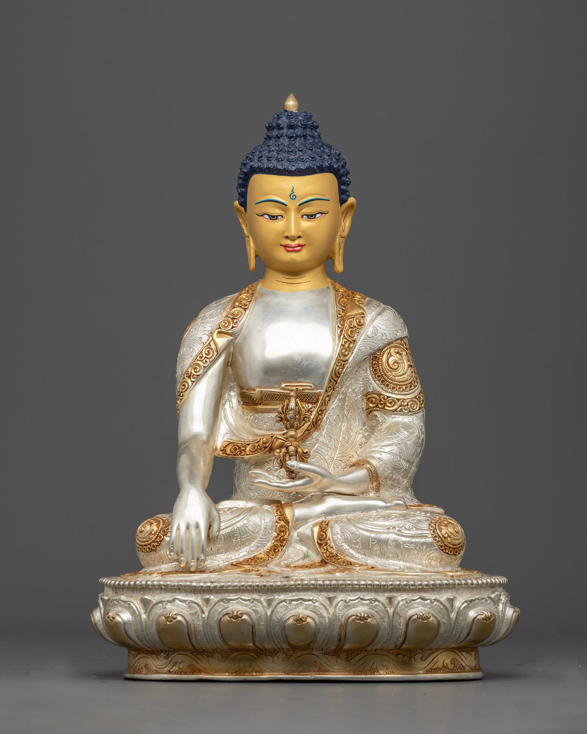 Mitrugpa Buddha Statue handcrafted in Nepal with gold gilding, silver-plated details, and gold-painted face