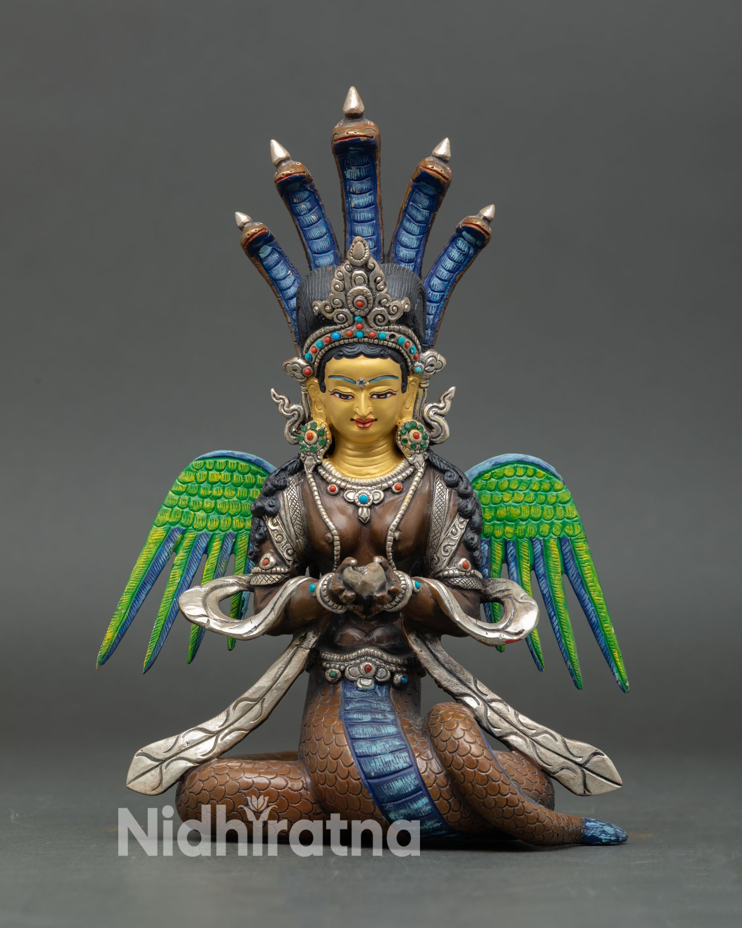 Naga Kanya statue front view copper serpent goddess five cobra heads gold face Nepal art