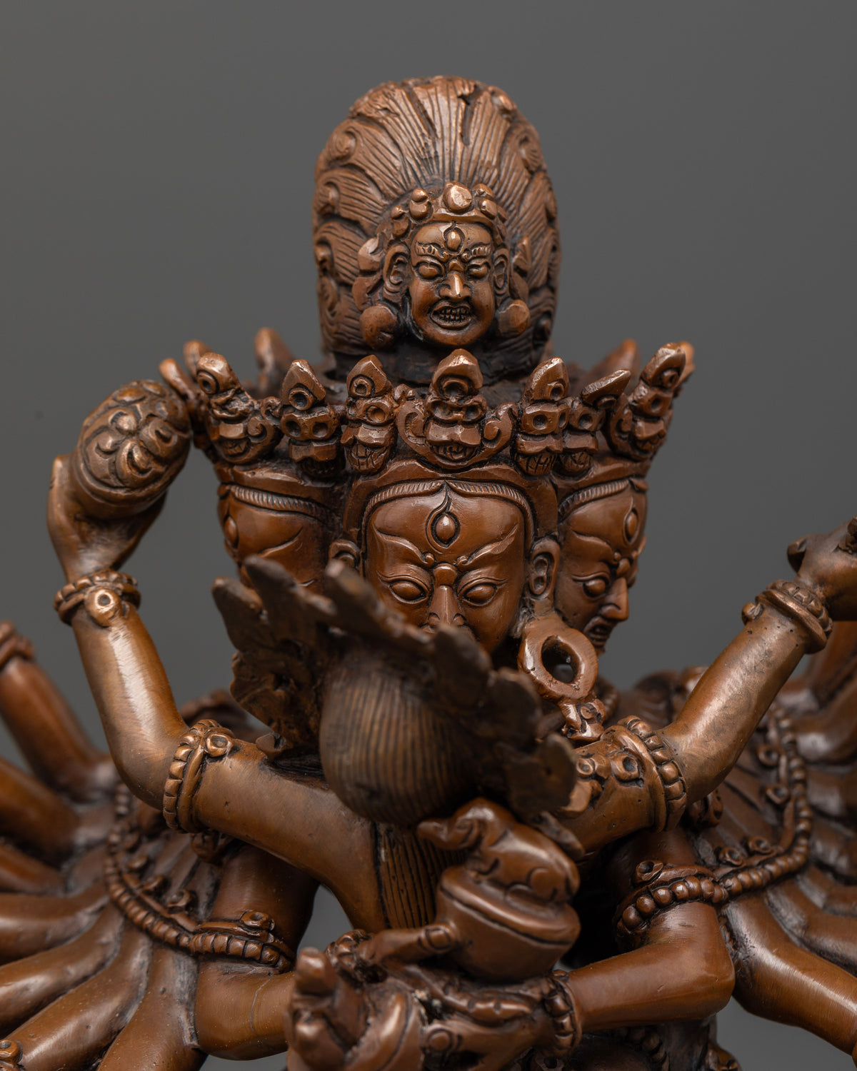 Nairatmya consort holding kapala and kartika knife in tantric buddhist statue.