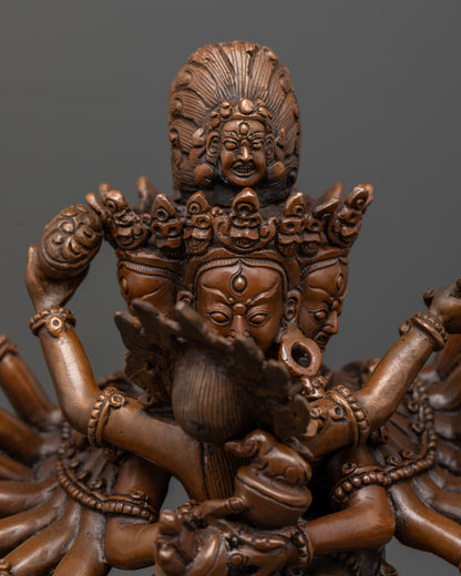 Nairatmya consort holding kapala and kartika knife in tantric buddhist statue.