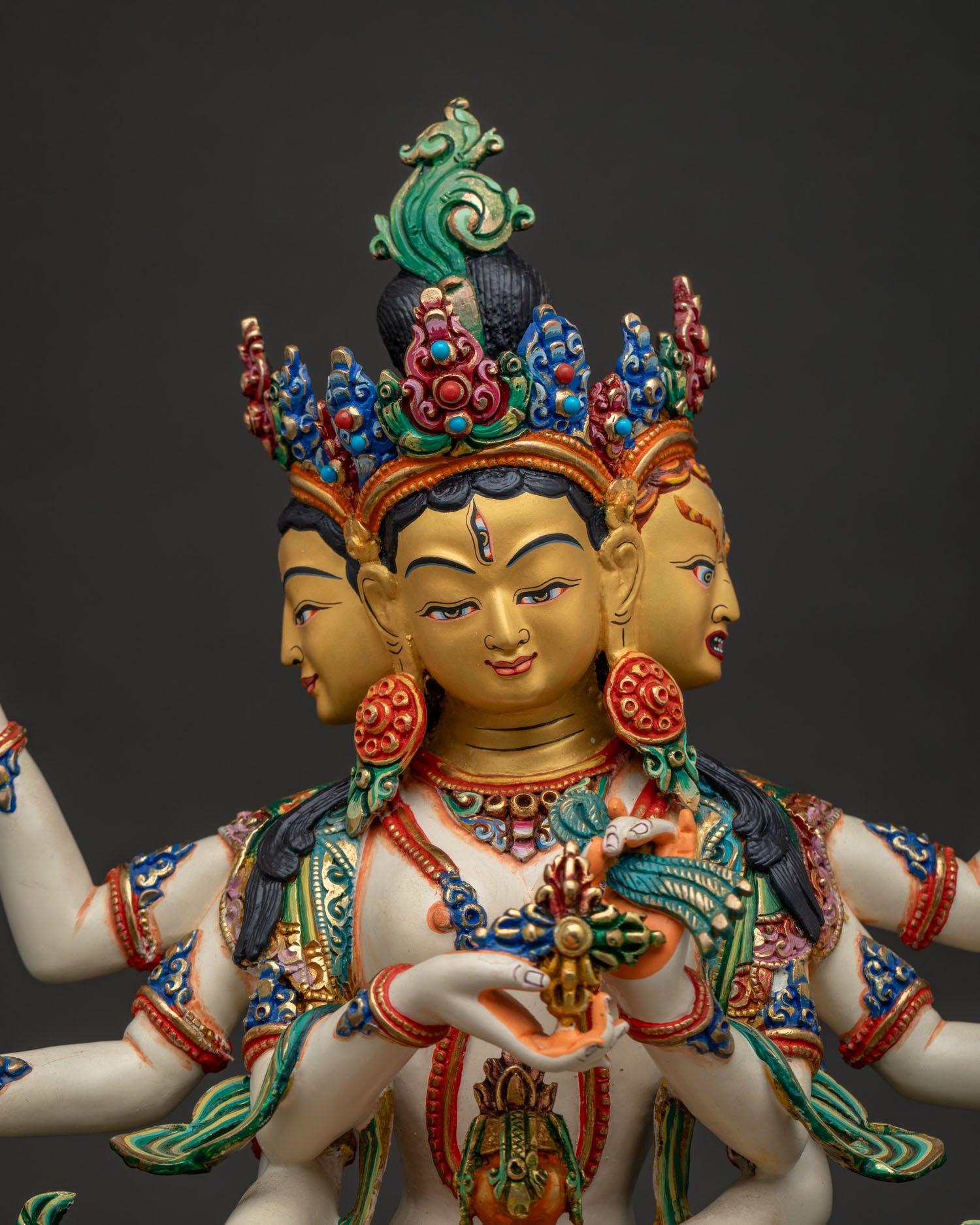 Namgyalma statue close-up, copper Buddhist goddess of longevity with ornate crown