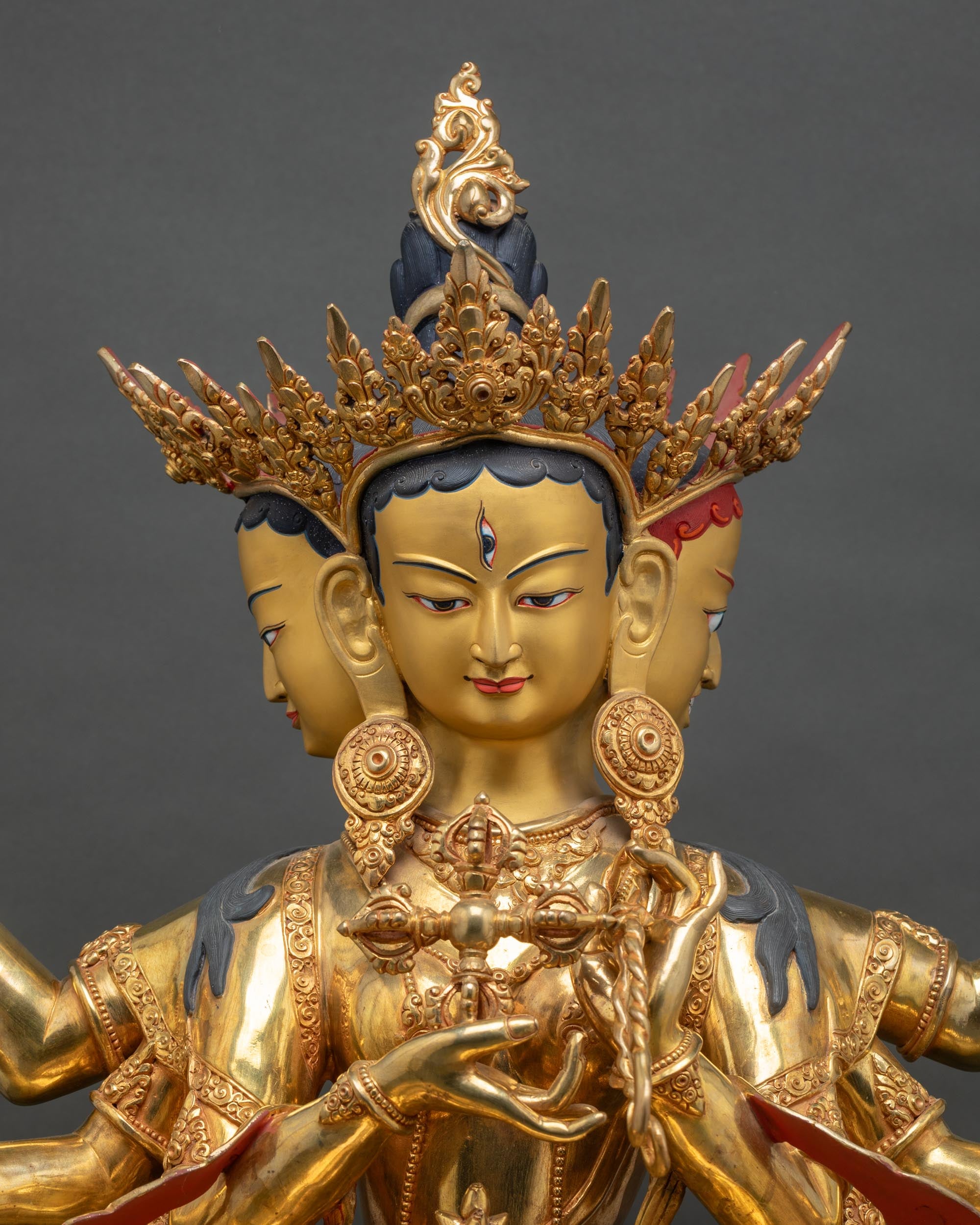 namgyalma-statue-close-up-three-faces-gold-painted-face-lost-wax-casting-nepal