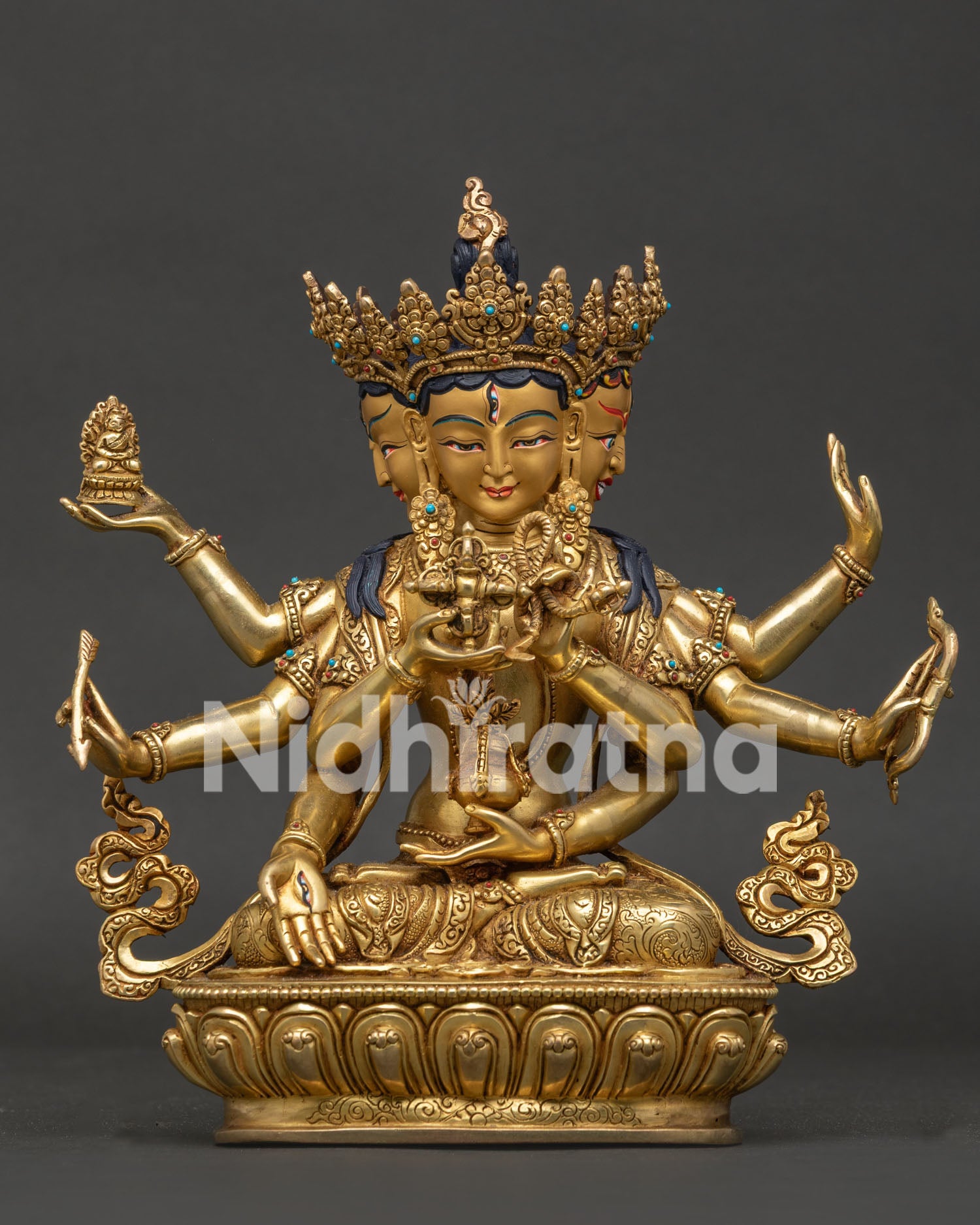 Namgyalma statue front view gold fire gilded copper Buddhist deity with lotus pedestal.