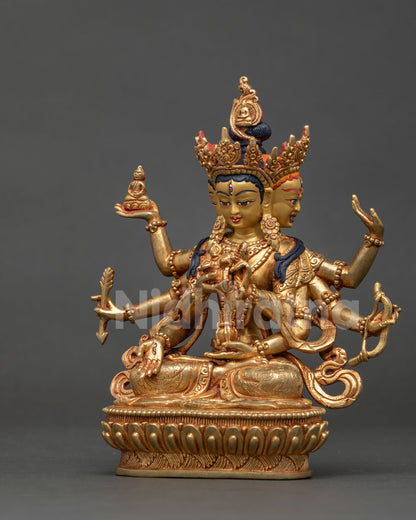 Namgyalma statue seated on hand carved lotus pedestal with floral motif silk garment.