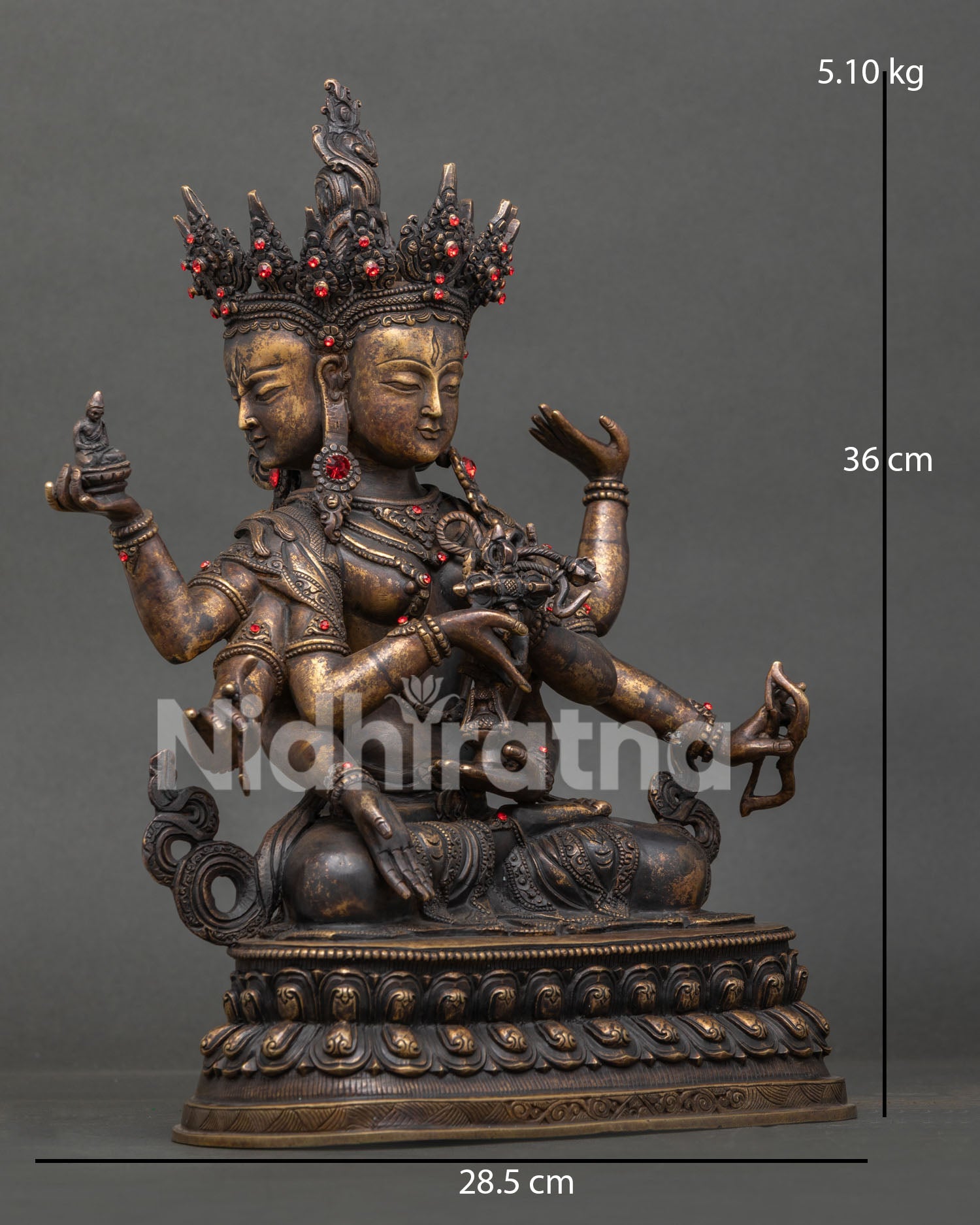 Namgyalma statue, three faced, eight armed Buddhist deity on double lotus pedestal Himalayan art