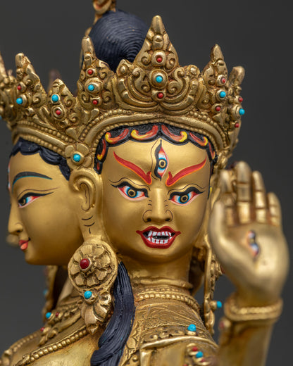 Namgyalma wrathful face detail showing three faced Buddhist deity expression and gold fire gilded copper craftsmanship.