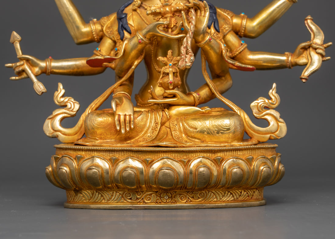 golden namgyalma statue sitting crossed leg