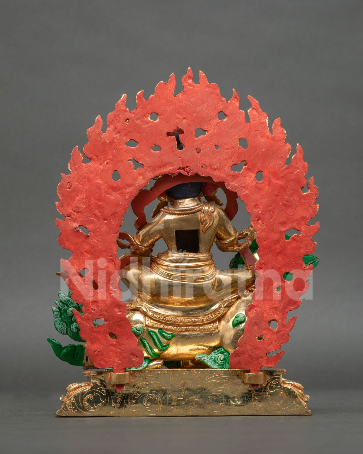 Namtoshe Statue back view blazing halo gold gilded copper Newari art Patan Nepal.