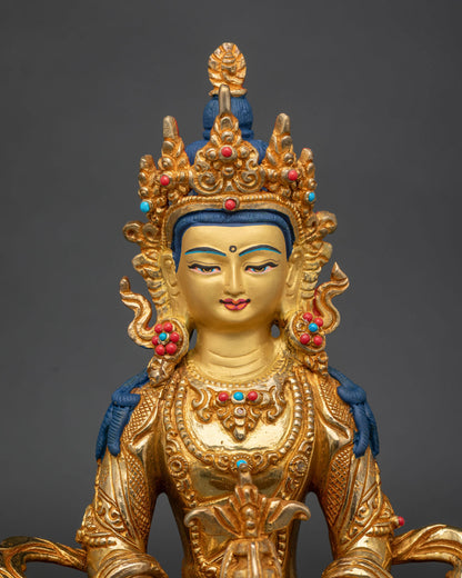 Nepalese Amitayus Buddha sculpture with gold painted face and semi precious stones