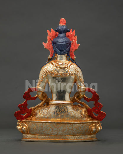 Nepalese Amitayus statue for buddhist altar showing lotus pedestal and meditative posture.