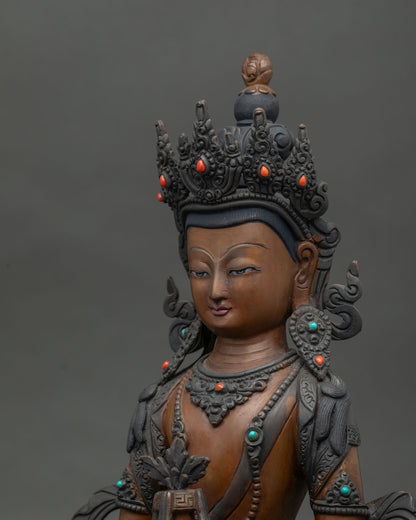 Nepalese Amitayus Statue with silk garment and semi precious stones.