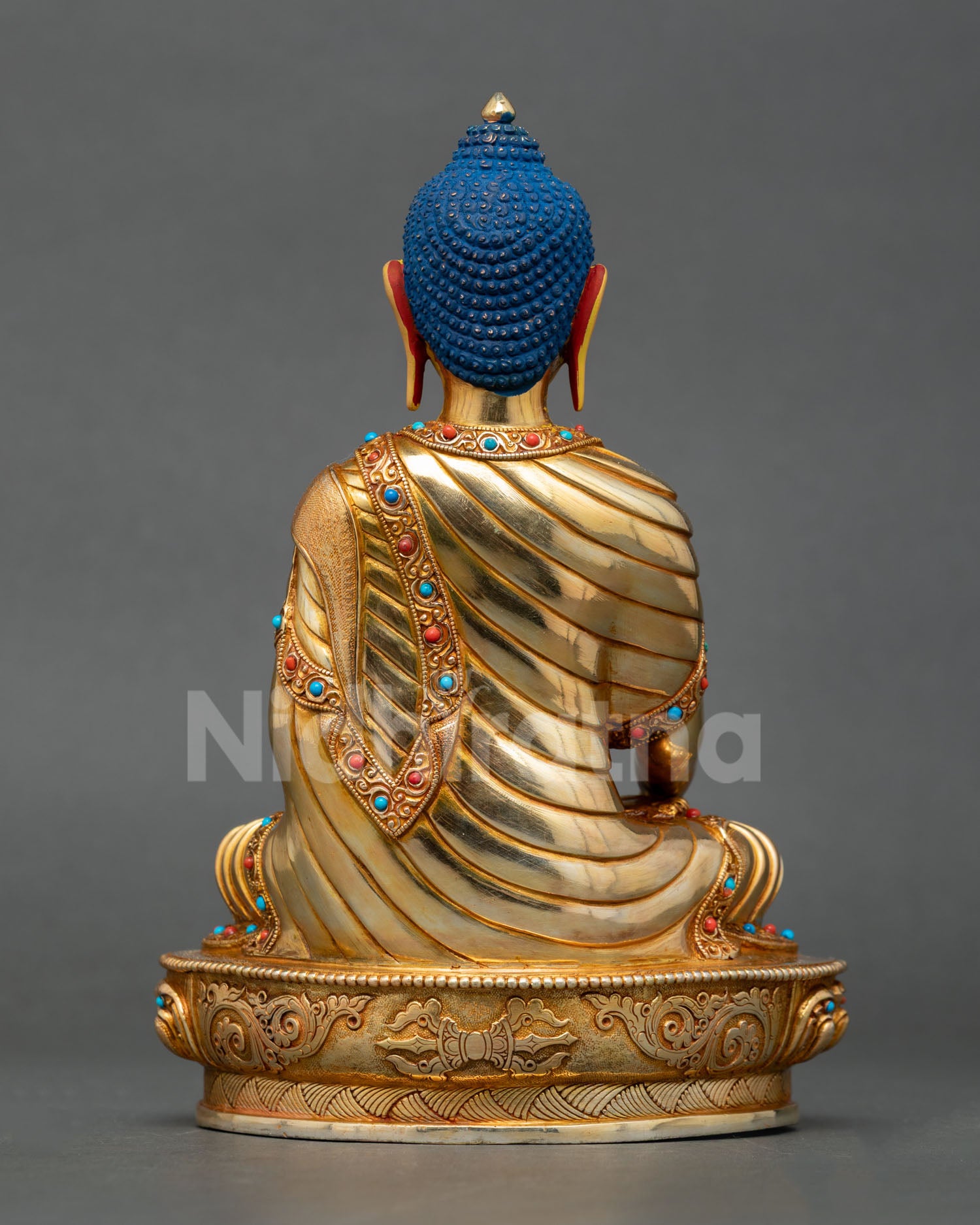 Nepalese Buddha Shakyamuni statue displaying intricate handcrafted Buddhist artistry