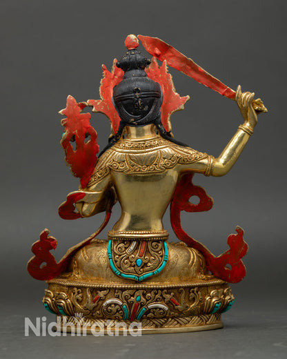Nepalese Buddhist art Manjushri wisdom statue, sacred symbol of enlightenment sculpture