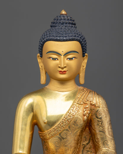 Nepalese Buddhist statue of Shakyamuni Buddha with copper craftsmanship and serene golden face