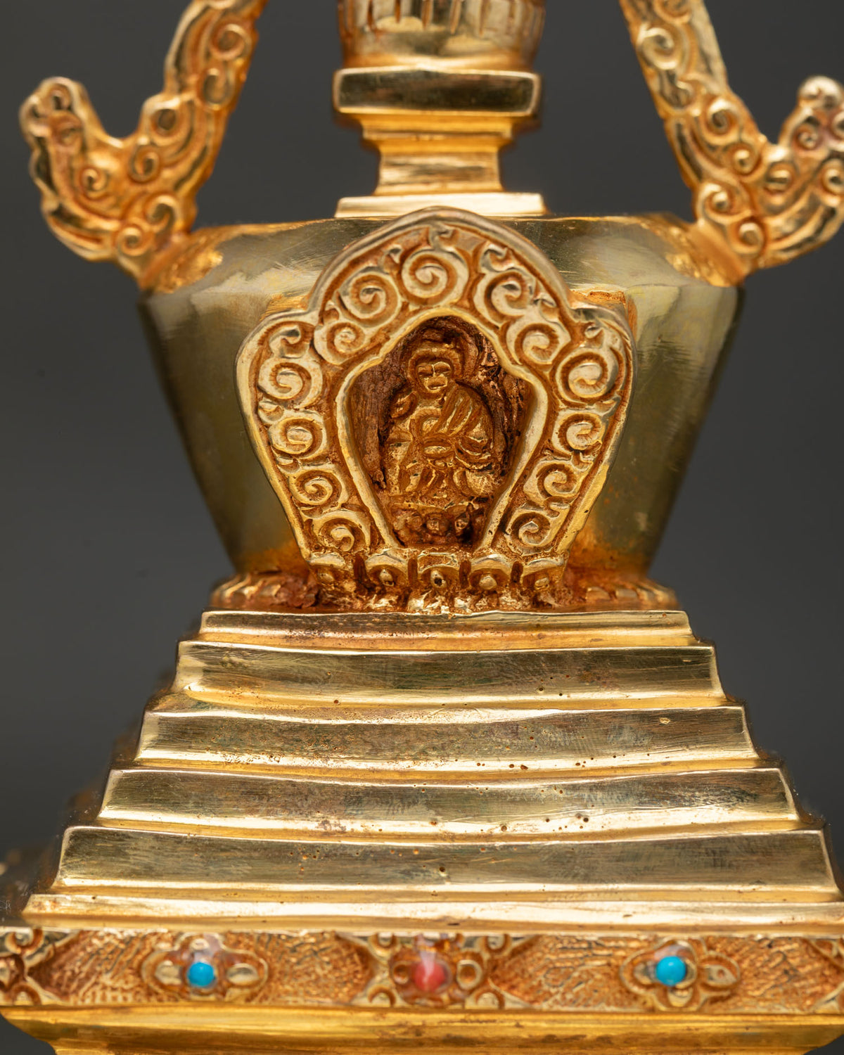 Nepalese Buddhist stupa featuring miniature Shakyamuni Buddha figure