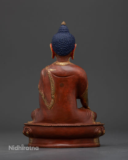 Nepalese copper Shakyamuni buddha seated on lotus throne.