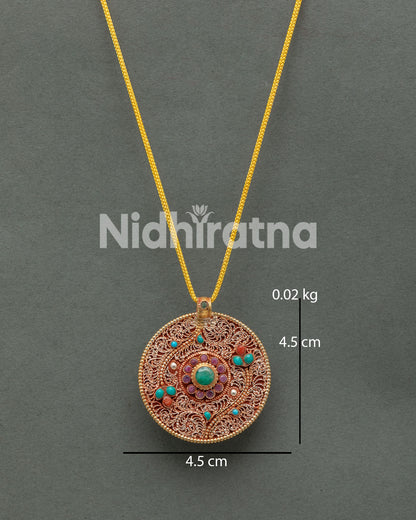 Nepalese floral locket showcasing gold-plated finish and traditional filigree artwork