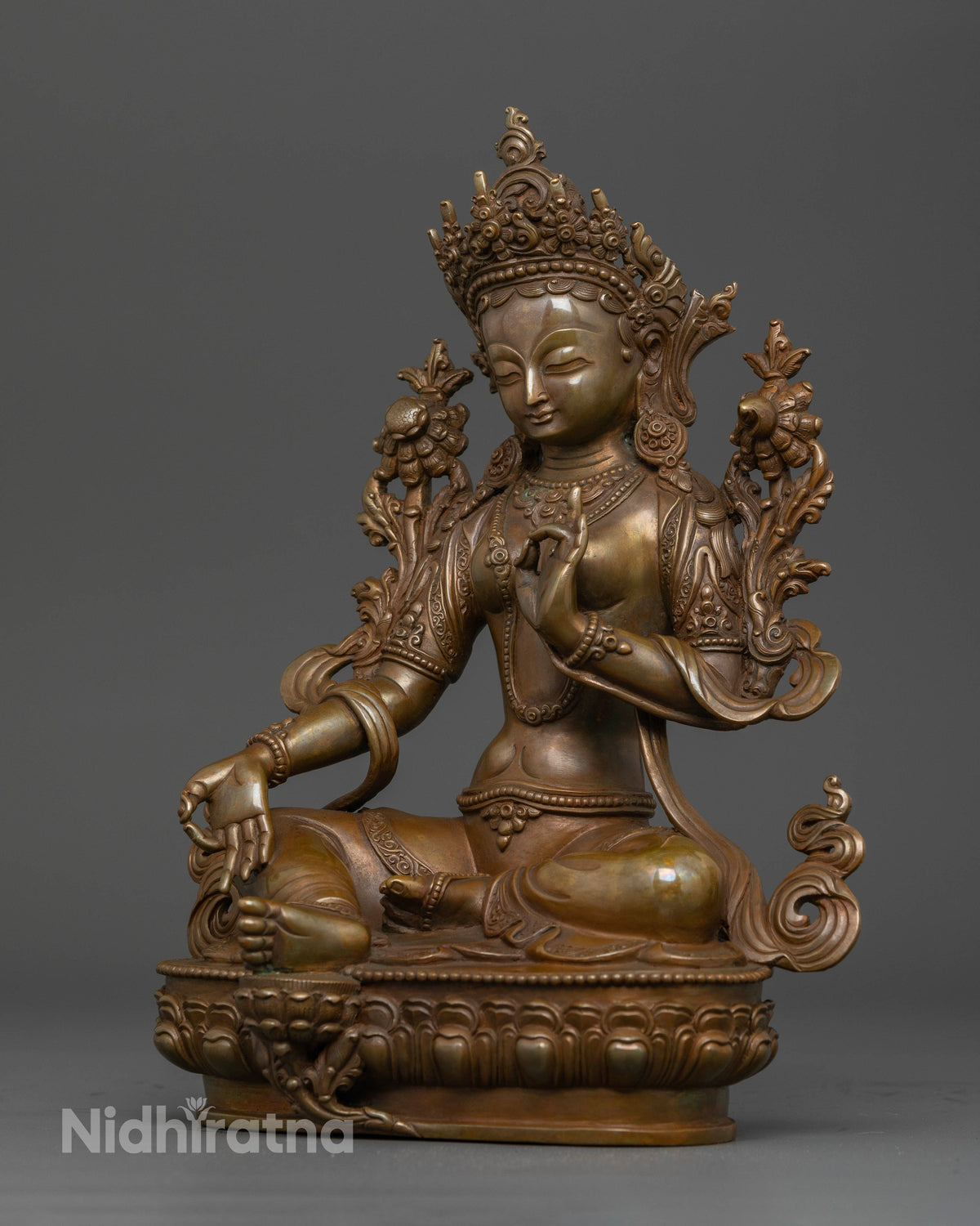 Nepalese Green Tara sculpture displaying the varada and vitarka mudras.