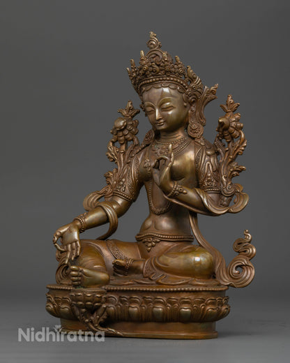 Nepalese Green Tara sculpture displaying the varada and vitarka mudras.